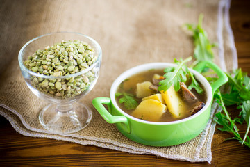 hot pea soup with meat and vegetables in a plate