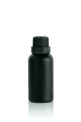 Mockup empty black bottle of essential oil isolated on white background with clipping path, vertical view.
