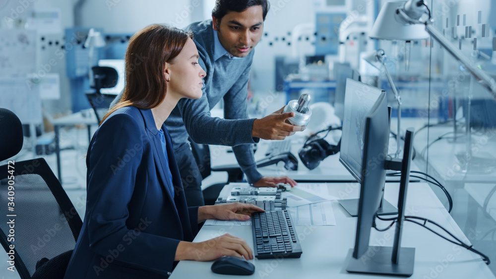 Poster modern factory office: male project supervisor talks to a female industrial engineer who works on co