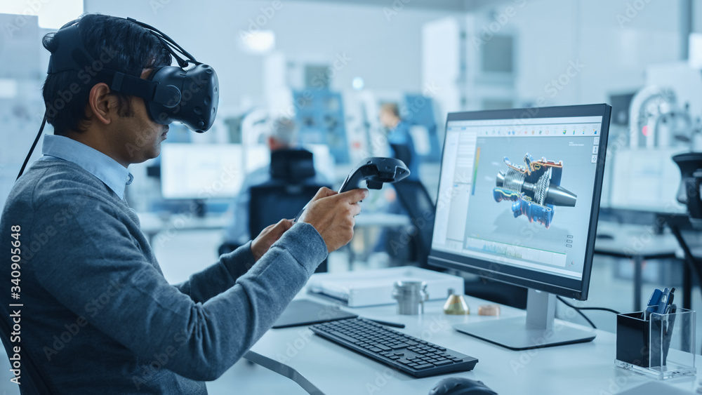 Leinwandbilder modern industrial factory: mechanical engineer wearing virtual reality headset, holding controllers,
