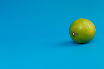 green lemon-lime on a blue background