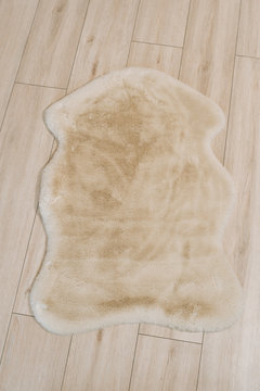 Small Interior Rug Made Of Faux Rabbit Fur . Interior Decoration Details.
