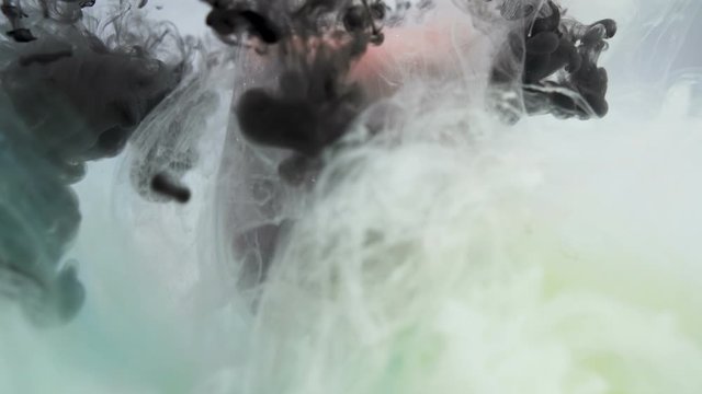 Abstract black and green smoke curls. Dark misty abstract background