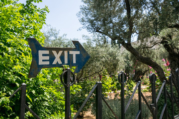 Exit sign in front of nature