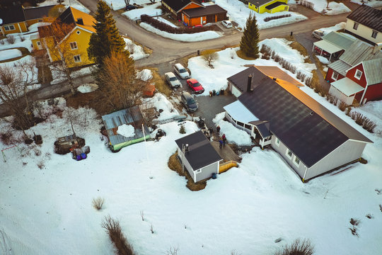 Drone Footage Of House In Snowy Village