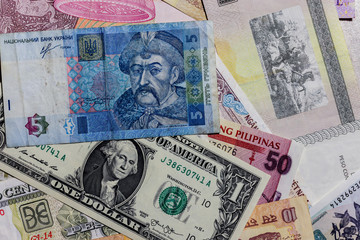 Moscow, Russia - April 20, 2020: One  US Dollar with  Ukrainian Hryvnia Banknotes