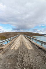 Wooden bridge for vehicles with overcast