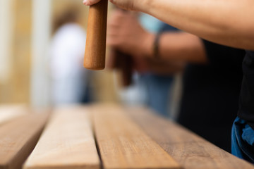Vintage musical instrument that produces music by striking different woods with each other with a rhythm