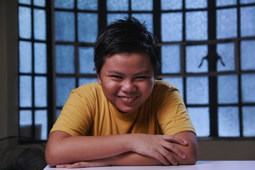 Young Asian boy smiling