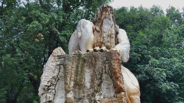 Tilting up shot to the "Guardian of Time" sculpture by Lebanese artist Tony Farah at Jeita Grotto in the Nahr al-Kalb valley of Lebanon