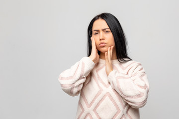 Tooth Pain And Dentistry. Beautiful Young Woman Suffering From Terrible Strong Teeth Pain, Touching Cheek With Hand. Female Feeling Painful Toothache. Dental Care And Health Concept. High Resolution