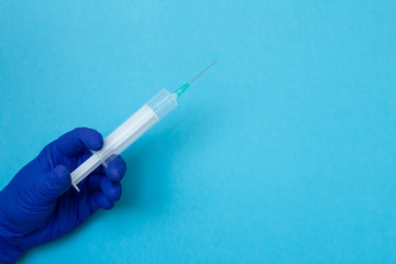 Doctor Hand Holding Syringe with Medicine Vaccine for Cure the Disease sickness ill, coronavirus,...