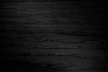 Naklejka premium Black wooden plank background