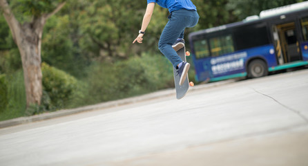 Skateboarder legs skateboarding at outdoors