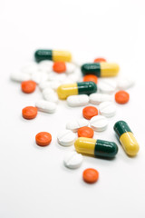 prescription pills on white background closeup
