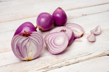 Red onion, lettuce. Health benefits, very rich in vitamins. Background for vegetables and garden plants and cooking.