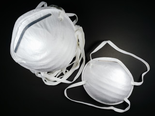 Close up, N95 white mask is used for germ and virus protection.