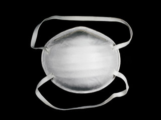 Close up, N95 white mask is used for germ and virus protection.