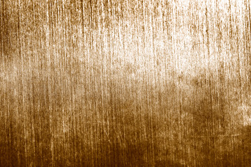Grunge faded gold textured background