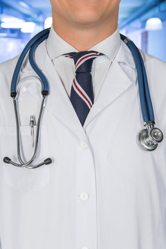 Professional Medical Team Posing, Doctor's Lab Coat And Stethoscope Close Up