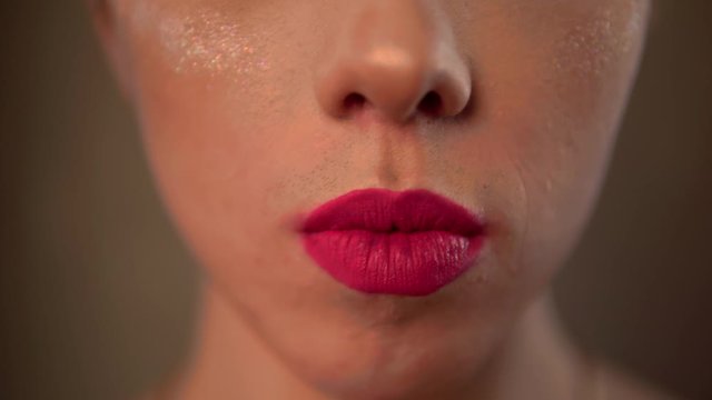 Gay biting licking lips. Close up homo transvestite pink lipstick, travesty diva