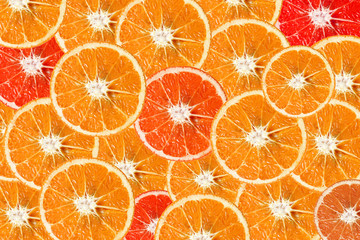 Citrus fruits background. Seamless pattern with pieces of orange, lemon, lime, grapefruit and kumquat