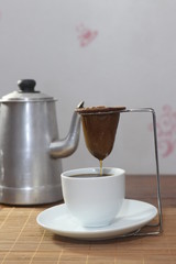 

strained coffee in filter cloth