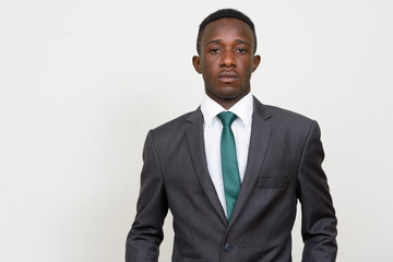 Portrait of young African businessman in suit