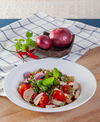 Spicy spicy salad with egg yolk and Vietnamese sausage with Thai vegetables