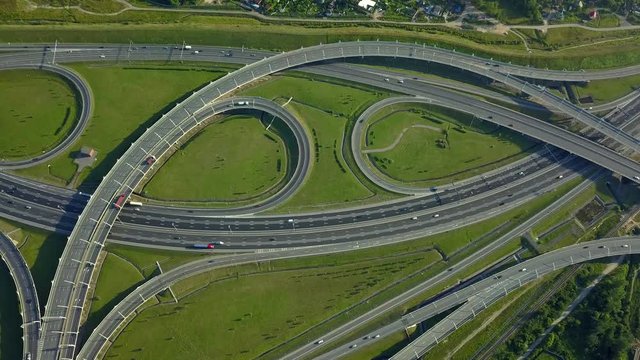 Helicopter flightover St.Petersburg active traffic intersection multilevel transport epic asphalt road junction. Modern urban expressway. Russia speed diameter. Many cars transport movement