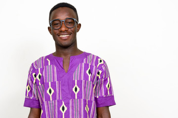 Portrait of happy young African man in traditional clothing