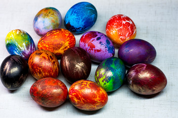 Painted in different colors Easter eggs on a white background