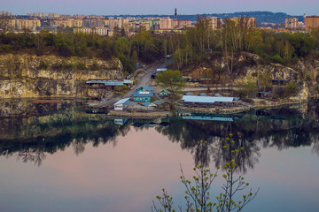 Obraz premium Diving center on the territory of the Twardowski rocks in Krakow, Poland At the bottom of lake the divers are awaited a flooded boat, bus and car