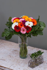 Flower bouquet in a vase in interior