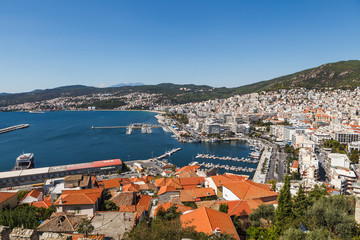 Fototapeta premium Aerial panoramic view of Greek resort Kavala, big port with old fortress and old town