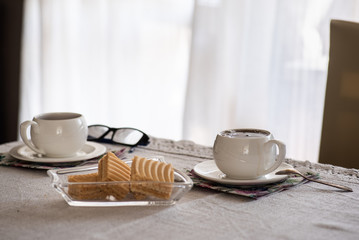 Two cups of tea or caffee