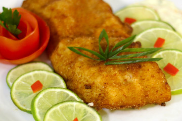 healthy food, breaded and grilled fish file, selective focus