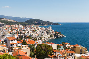 Fototapeta na wymiar Aerial panoramic view of Greek resort Kavala, big port with old fortress and old town