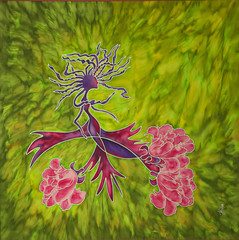  The figure of a woman on a green flowering background, symbolizing a summer.