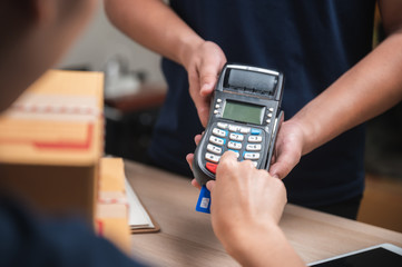 business paying with credit card machine, client purchase payment concept