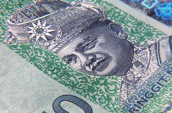 Extreme close up on a RM 50 banknote. Super macro photography of 50 Ringgit Malaysia. The portrait of the first Agong or King Tuanku Abdul Rahman. Malaysian currency closeup 