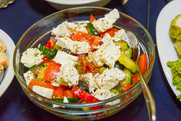 Greek salad in bowl close up