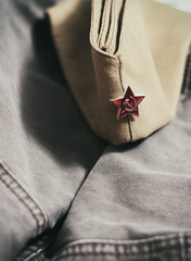 Uniform cap of a Soviet soldier of the WWII with a star. In memory of Victory Day on May 9th.