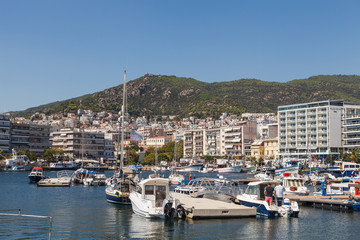 Fototapeta na wymiar KAVALA, GREECE - SEPTEMBER, 15, 2018: Seaside and harbour