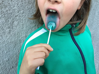 girl with blue lollipop