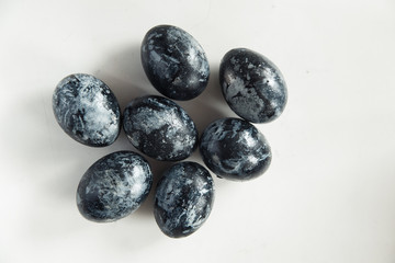 Easter black eggs on the white background