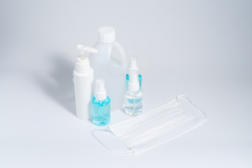Alcohol gel, liquid and mask set in bottles for hand cleaning, virus cleaner set