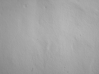 surface of the cement wall is rough, paint light gray color in texture material concrete background