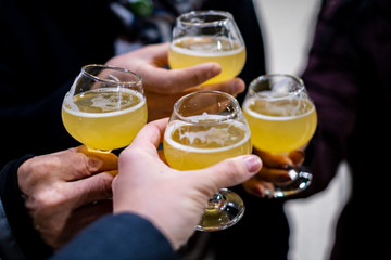 People toasting with beer