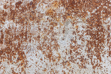 Rusty metal surface. Grunge metallic texture background with scratches and cracks.